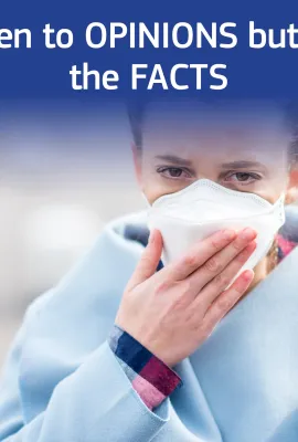 woman in mask and with mobile phone